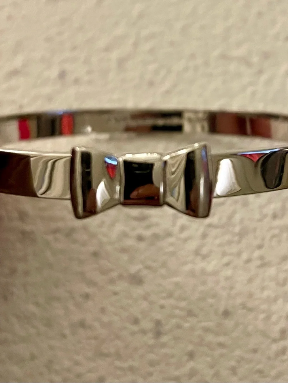 kate spade silver-tone bow bangle bracelet